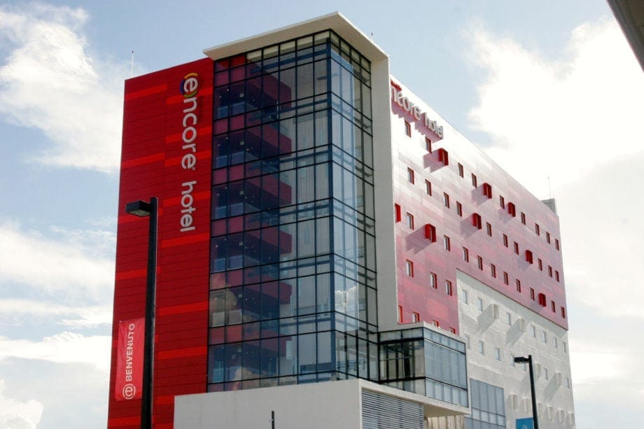 Hotel Encore by Wyndham Querétaro using Fundermax's Max Compact Exterior panels with a rainscreen facade application.