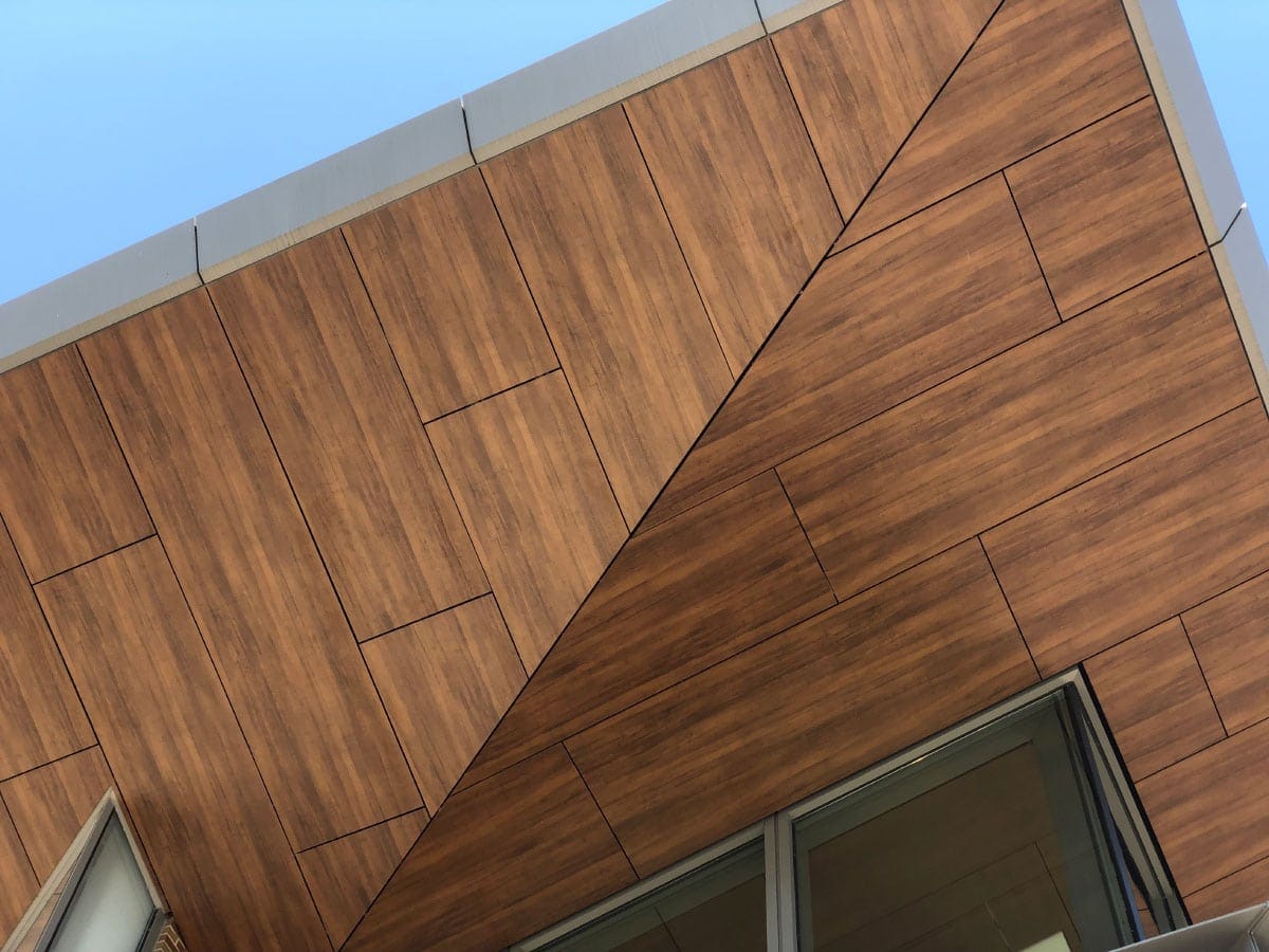 Woodgrain soffit using Fundermax's panels and a concealed system