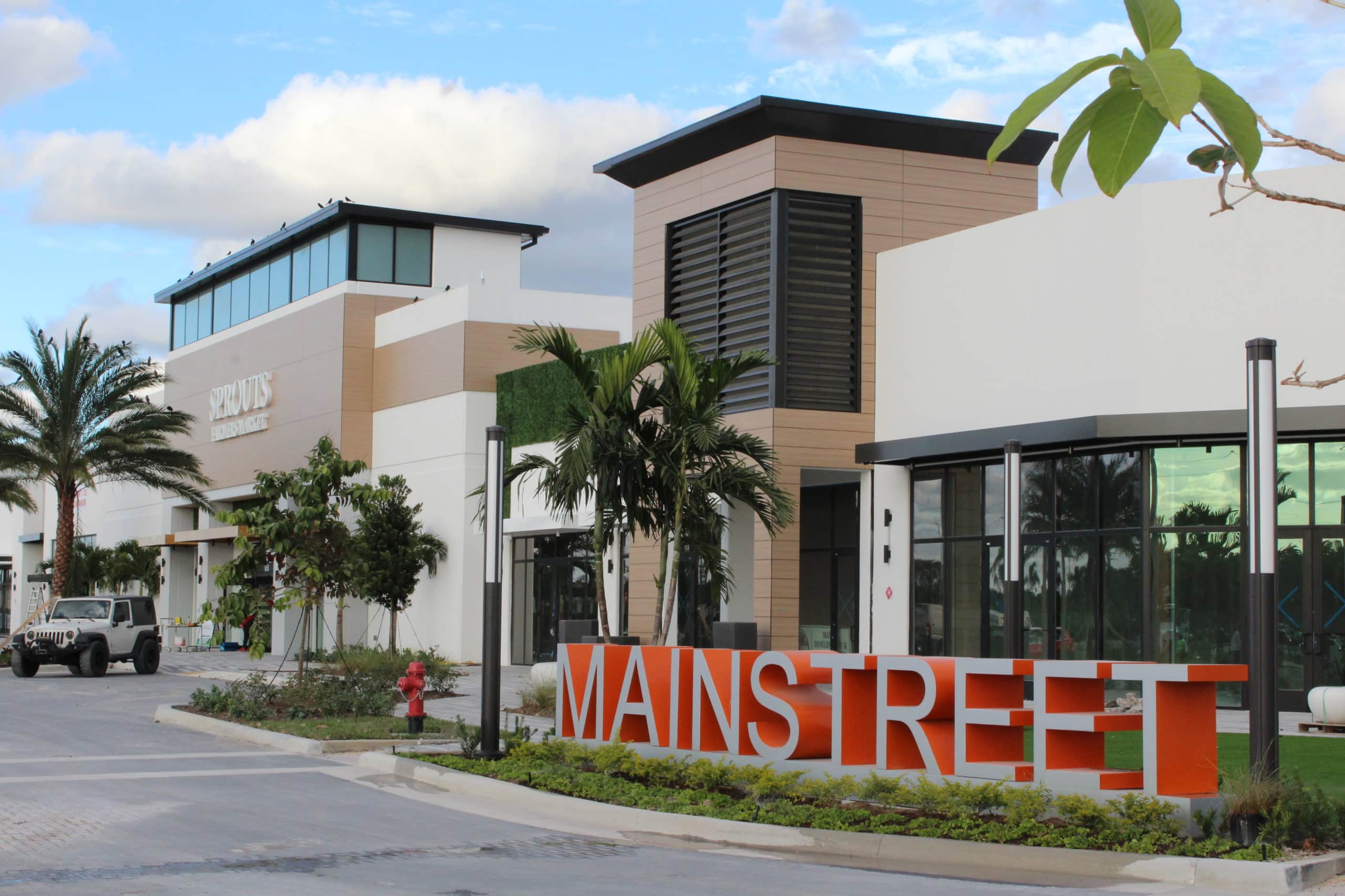 Rainscreen Façade from Fundermax with Exterior Soffits for the Mainstreet Shopping Center.