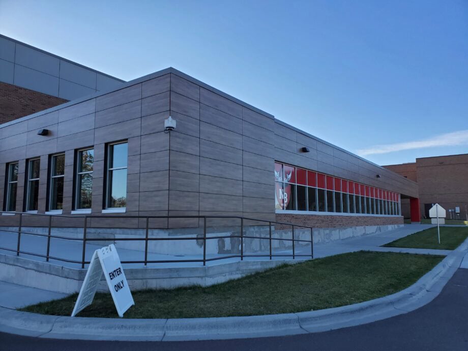 The corner of the phenolic facade at North Branch High School, featuring Max Compact Exterior phenolic panels in Ecuador